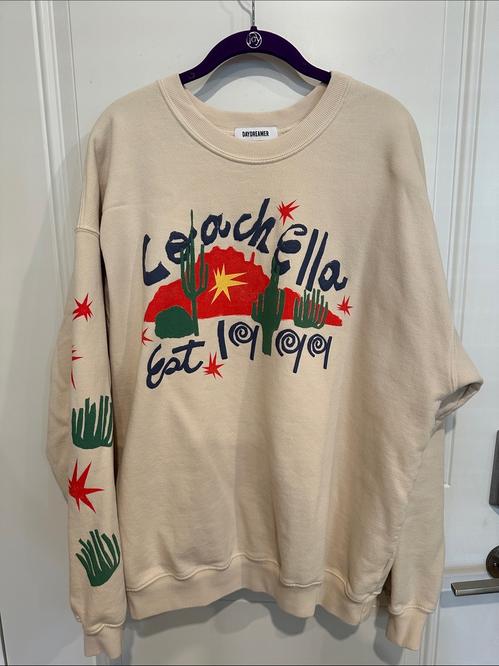 Daydreamer 2025 Coachella Sweatshirt Cream with Red & Green Desert Graphic